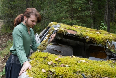 Cisgender-gay-man-Alaska-LGBTQ-with-abandoned-car