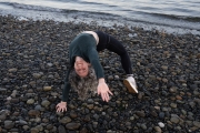 Cisgender-woman-yoga-on-beach-LGBTQ-Washington