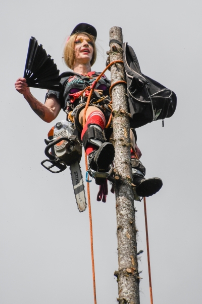 Drag-queen-lumberjack-on-tree-top-LGBTQ-Alaska