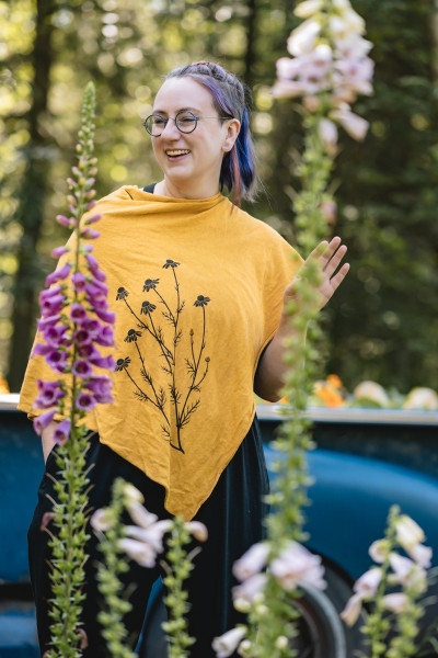 Nonbinary-demigirl-Alaska-LGBTQ-with-wildflowersjpg